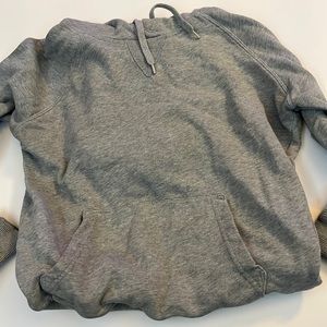 Gray form fitting hoodie. Perfect for under flannels it’s nice and thin.